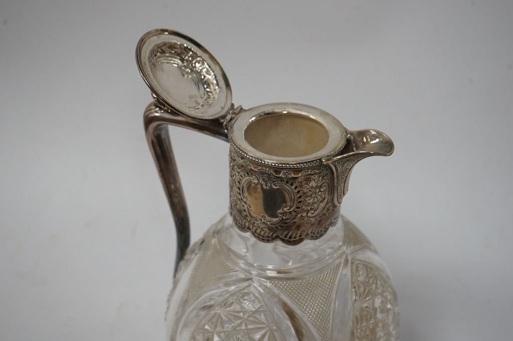 A late Victorian silver mounted cut glass claret jug, Z. Barraclough & Sons, Sheffield, 1894, 21cm. Condition - poor to fair